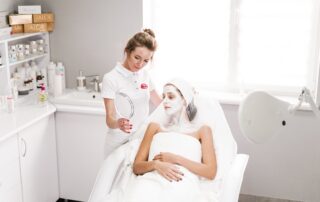 esthetician working on a patient