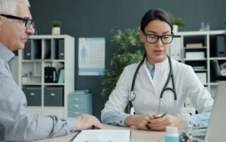 Medical practitioner at a medspa talking with a colleague